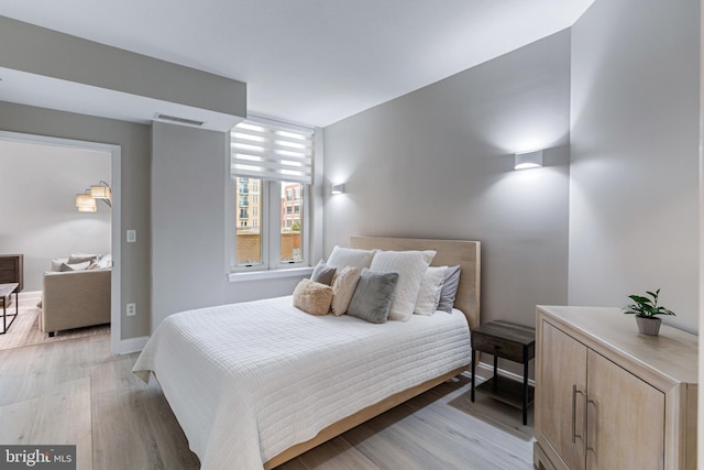 155 Potomac Psge Unit 237, National Harbor, MD 20745 - bedroom with light wood finished floors