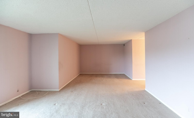 20630 Valley Forge Cir Unit 630, King Of Prussia, PA 19406 - empty room with carpet and a textured ceiling
