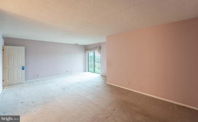 20630 Valley Forge Cir Unit 630, King Of Prussia, PA 19406 - carpeted spare room with baseboards and a textured ceiling