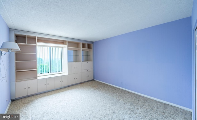 20630 Valley Forge Cir Unit 630, King Of Prussia, PA 19406 - unfurnished bedroom with carpet flooring and a textured ceiling