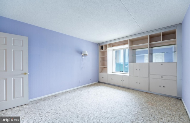 20630 Valley Forge Cir Unit 630, King Of Prussia, PA 19406 - unfurnished bedroom with carpet floors and a textured ceiling
