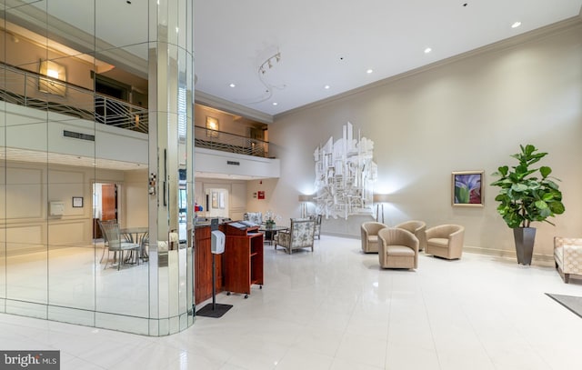 20630 Valley Forge Cir Unit 630, King Of Prussia, PA 19406 - building lobby featuring a high ceiling, ornamental molding, and recessed lighting