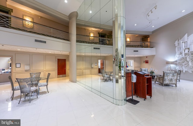 20630 Valley Forge Cir Unit 630, King Of Prussia, PA 19406 - building lobby with ornamental molding, a high ceiling, and recessed lighting