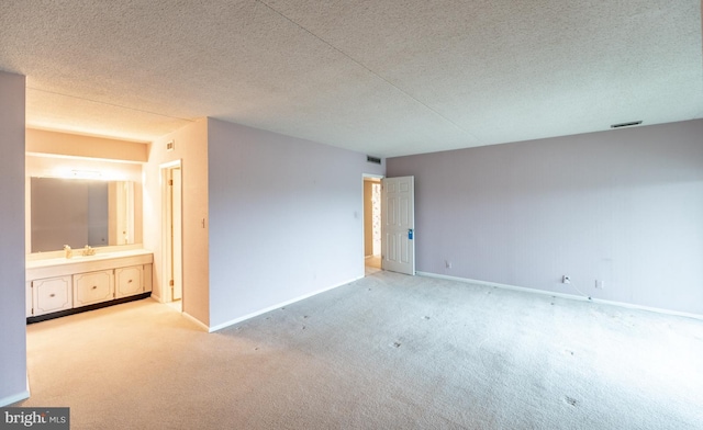 20630 Valley Forge Cir Unit 630, King Of Prussia, PA 19406 - carpeted empty room with a textured ceiling