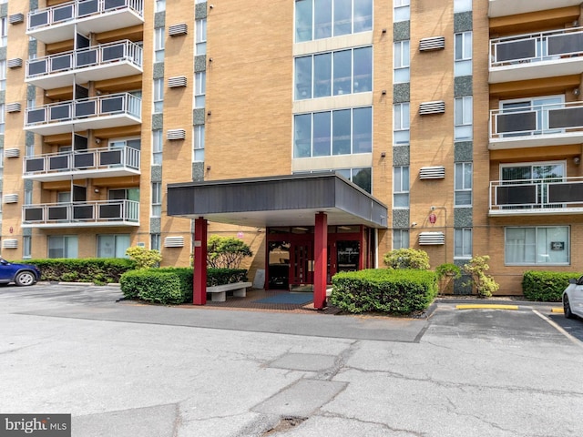 200 Highland Ave Unit 203, State College, PA 16801 - view of apartment building / complex with uncovered parking