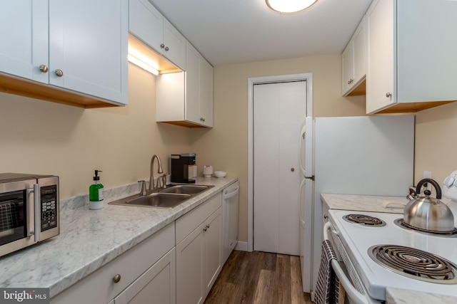 200 Highland Ave Unit 203, State College, PA 16801 - kitchen featuring white appliances, dark wood finished floors, light countertops, and white cabinets