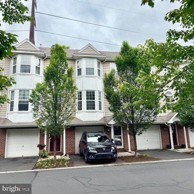 27 Cameron Ct Unit 27, Royersford, PA 19468 - multi unit property featuring driveway, brick siding, and an attached garage
