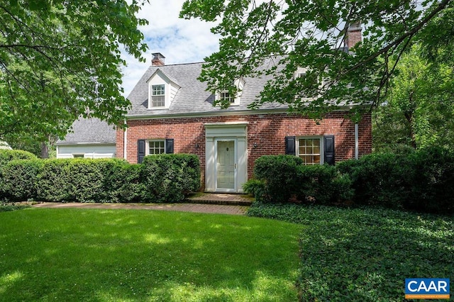 1614 Meadowbrook Heights Rd, Charlottesville, VA 22901 - new england style home with a chimney, a front yard, brick siding, and a shingled roof