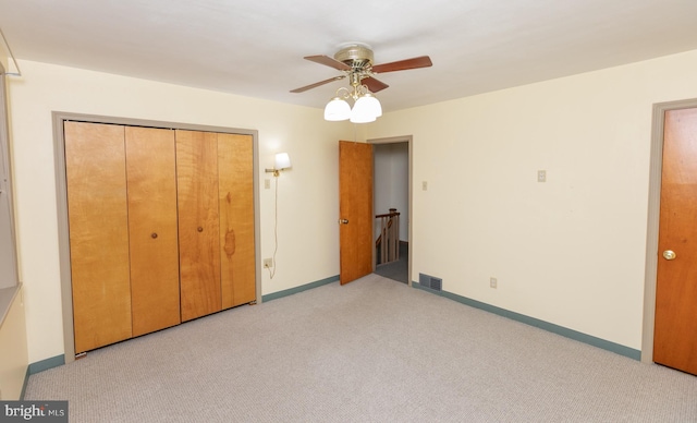 4239 Elbridge St, Philadelphia, PA 19135 - unfurnished bedroom with light carpet, a closet, and ceiling fan