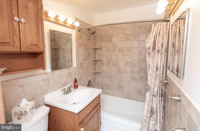 4239 Elbridge St, Philadelphia, PA 19135 - bathroom with tile walls, vanity, and shower / tub combo