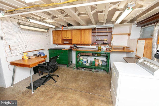 4239 Elbridge St, Philadelphia, PA 19135 - below grade area with a workshop area and washer / clothes dryer