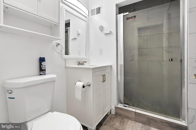 9355 Pan Ridge Rd Unit 9355, Parkville, MD 21234 - full bath featuring a stall shower, vanity, and wood finished floors
