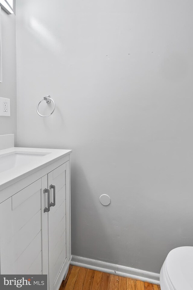 9355 Pan Ridge Rd Unit 9355, Parkville, MD 21234 - bathroom with wood finished floors and vanity