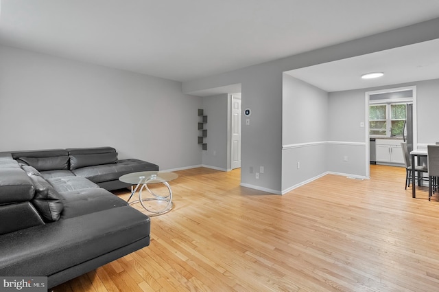 9355 Pan Ridge Rd Unit 9355, Parkville, MD 21234 - living room with light wood finished floors and baseboards
