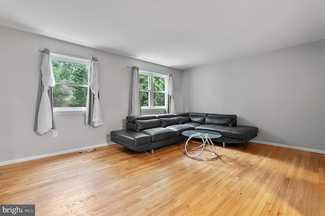 9355 Pan Ridge Rd Unit 9355, Parkville, MD 21234 - living area with hardwood / wood-style floors and baseboards