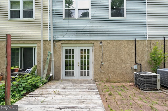 9355 Pan Ridge Rd Unit 9355, Parkville, MD 21234 - doorway to property with stucco siding, french doors, and a wooden deck