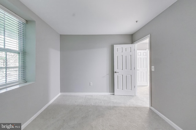 1869 Cedar Cove Way Unit 101, Woodbridge, VA 22191 - unfurnished room with carpet flooring and fire sprinkler in ceiling