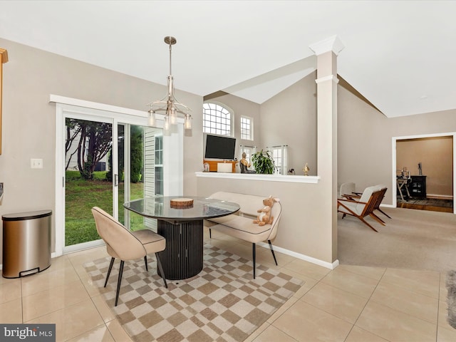 14228 Golden Hook Rd, Boyds, MD 20841 - dining space with light tile patterned floors, light colored carpet, and high vaulted ceiling
