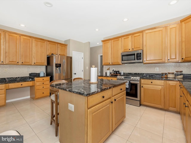 14228 Golden Hook Rd, Boyds, MD 20841 - kitchen featuring stainless steel appliances, light tile patterned floors, a center island, decorative backsplash, and recessed lighting