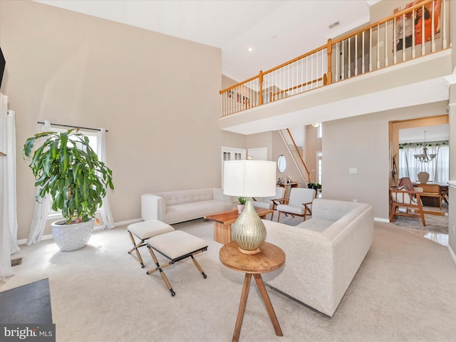 14228 Golden Hook Rd, Boyds, MD 20841 - living area with a high ceiling, carpet floors, a chandelier, and recessed lighting