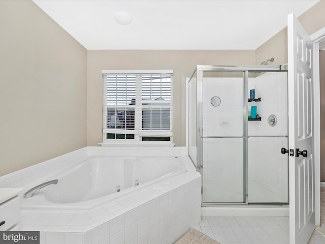14228 Golden Hook Rd, Boyds, MD 20841 - bathroom with a whirlpool tub, a stall shower, tile patterned flooring, and vanity