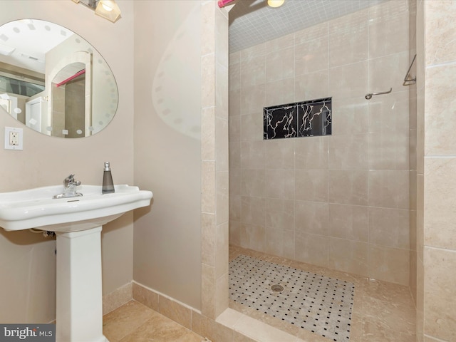 14228 Golden Hook Rd, Boyds, MD 20841 - bathroom featuring tiled shower and tile patterned flooring
