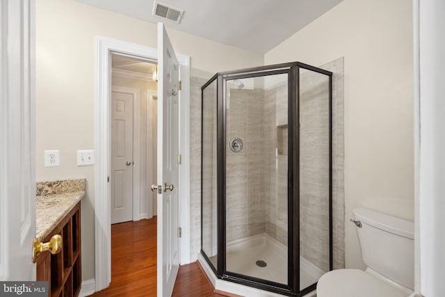 11021 Folksie Ct Unit 201, Manassas, VA 20109 - full bath with a shower stall, vanity, and wood finished floors
