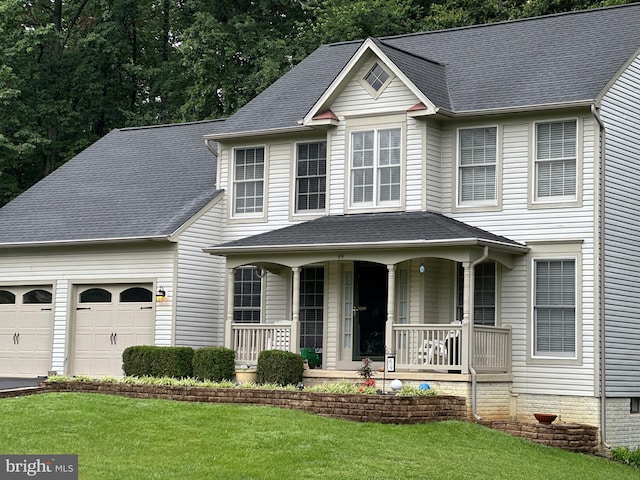 69 Cardinal Forest Dr, Fredericksburg, VA 22406 - view of front of property featuring covered porch, a front lawn, an attached garage, and a shingled roof