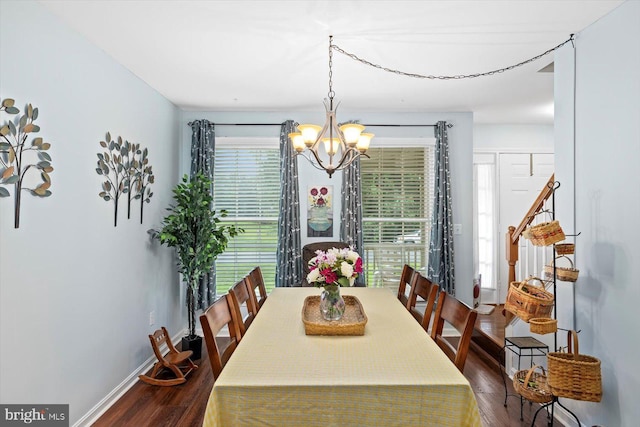 69 Cardinal Forest Dr, Fredericksburg, VA 22406 - dining space with dark wood-type flooring and a chandelier
