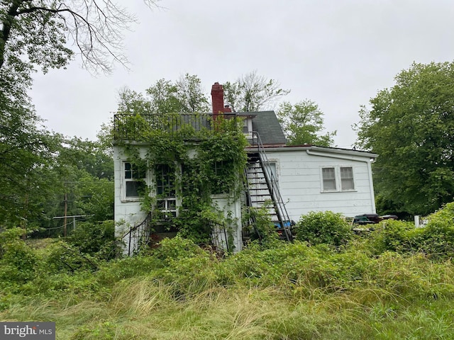 5513 Taylor Rd, Riverdale, MD 20737 - view of home's exterior featuring a chimney