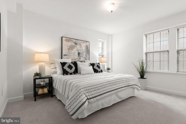 1314 Massachusetts Ave NW Unit 603, Washington, DC 20005 - bedroom featuring carpet floors and baseboards