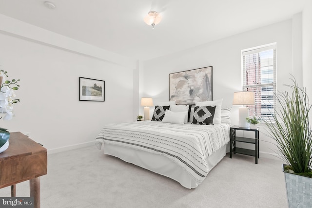 1314 Massachusetts Ave NW Unit 603, Washington, DC 20005 - bedroom with carpet flooring and baseboards