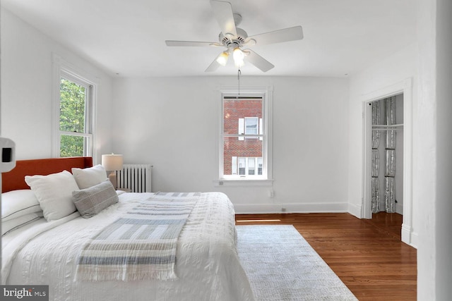 1329 Delafield Pl NW, Washington, DC 20011 - bedroom featuring radiator, wood finished floors, and a ceiling fan