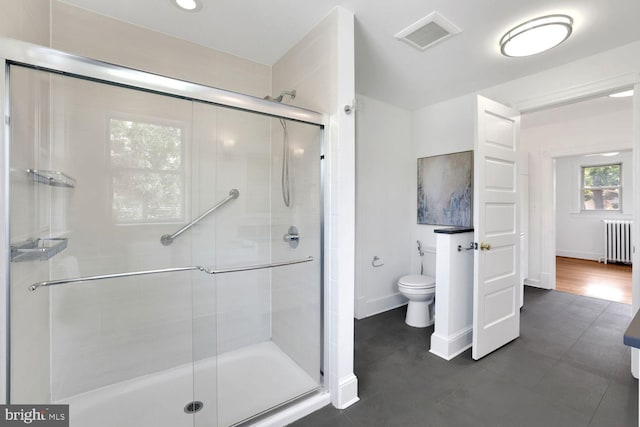 1329 Delafield Pl NW, Washington, DC 20011 - full bath with radiator heating unit, a stall shower, and tile patterned floors