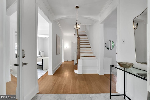 1329 Delafield Pl NW, Washington, DC 20011 - foyer entrance with stairway, crown molding, and light wood-style flooring