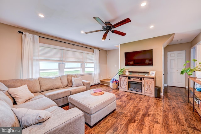 67 Neptune Ln, Levittown, PA 19054 - living room with a ceiling fan, dark wood-type flooring, recessed lighting, and a glass covered fireplace