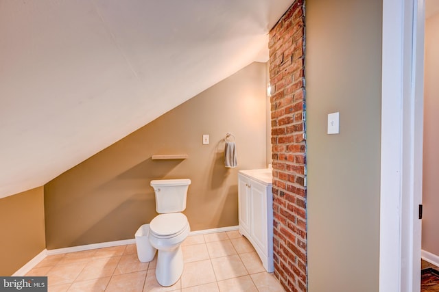 67 Neptune Ln, Levittown, PA 19054 - bathroom featuring vaulted ceiling, vanity, and tile patterned flooring