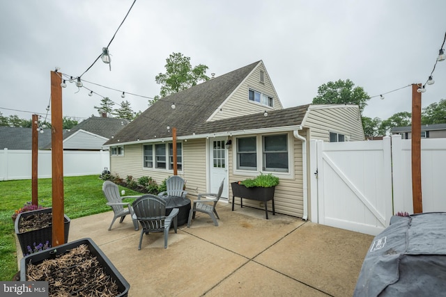 67 Neptune Ln, Levittown, PA 19054 - fenced backyard with a gate and a patio area