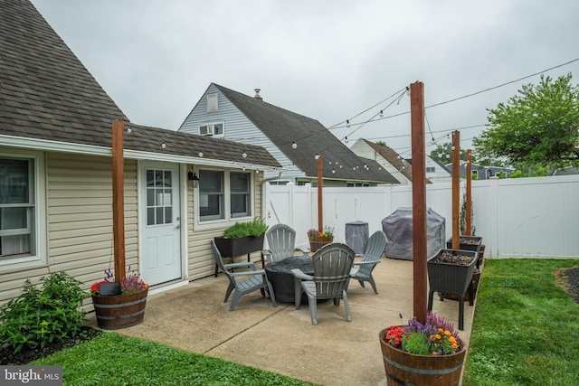 67 Neptune Ln, Levittown, PA 19054 - fenced backyard with a grill and a patio area