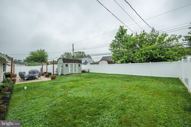 67 Neptune Ln, Levittown, PA 19054 - fenced backyard with a patio area and a shed