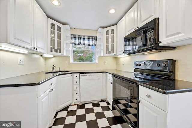 547 Overlook, Philadelphia, PA 19128 - kitchen featuring electric range oven, white dishwasher, black microwave, dark floors, and dark countertops