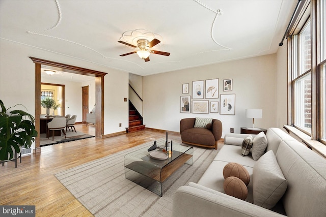 547 Overlook, Philadelphia, PA 19128 - living room with stairs, ceiling fan, and light wood-style floors