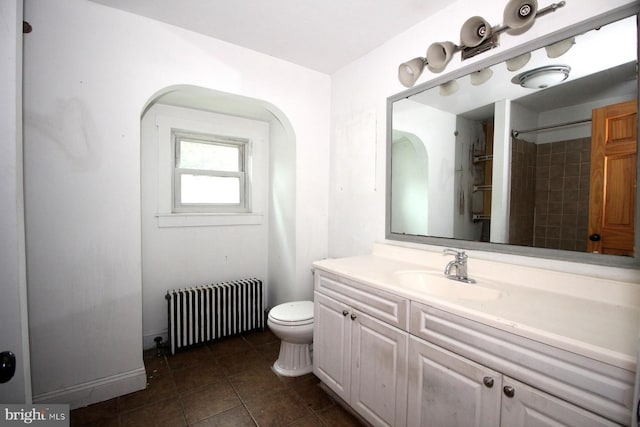 538 N 11th St, Philipsburg, PA 16866 - bathroom featuring radiator, vanity, tile patterned floors, and a shower