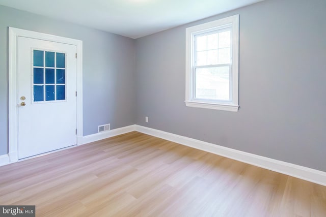 6 Carroll Rd, Catonsville, MD 21228 - empty room with light wood-style flooring and baseboards