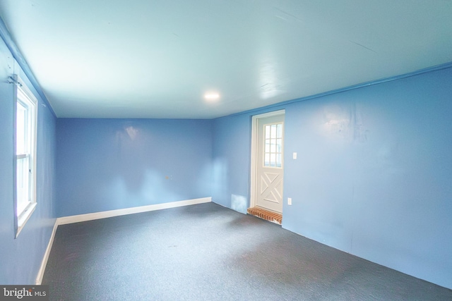 6 Carroll Rd, Catonsville, MD 21228 - carpeted empty room with baseboards