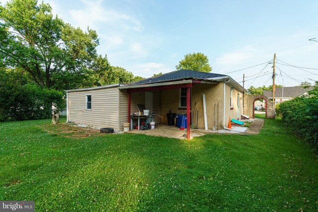 6 Carroll Rd, Catonsville, MD 21228 - back of house with a yard and stucco siding