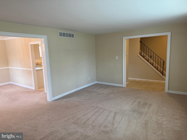 15 Deerfield Ln, Sewell, NJ 08080 - spare room with carpet floors and stairs