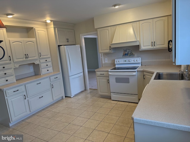 15 Deerfield Ln, Sewell, NJ 08080 - kitchen featuring white appliances, premium range hood, light tile patterned floors, light countertops, and backsplash
