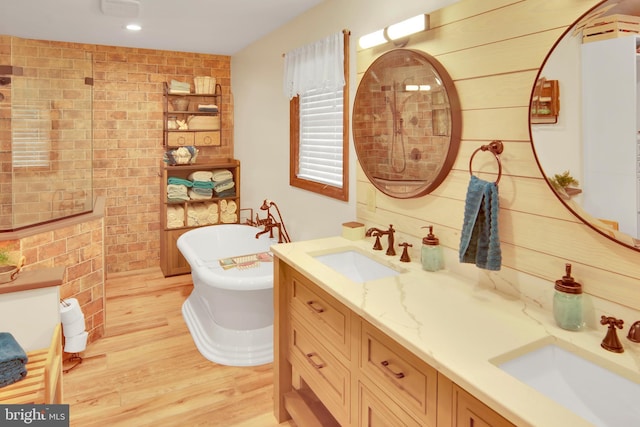 20412 Holt Cir, Hagerstown, MD 21742 - full bathroom featuring wood finished floors, double vanity, and a soaking tub