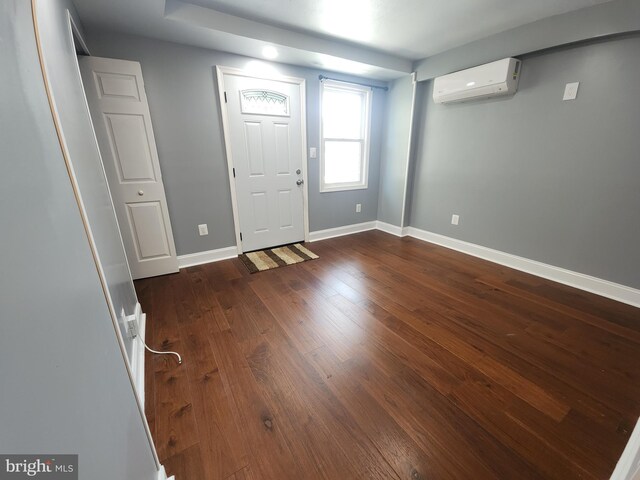 2258 Arlington Ter, Alexandria, VA 22303 - foyer featuring a wall mounted AC and dark wood finished floors
